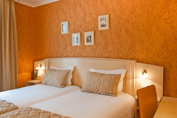 Imagen de la habitación del Hotel Elys&eacute;es Op&eacute;ra. Foto 12