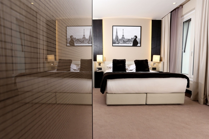 Imagen de la habitación del Hotel Elysées Paris. Foto 5