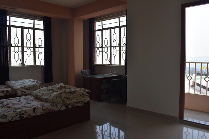 Imagen de la habitación del Hotel Elysian Home. Foto 2