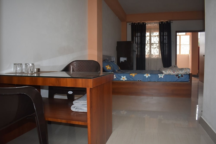 Imagen de la habitación del Hotel Elysian Home. Foto 7