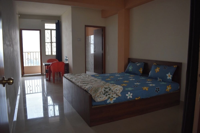 Imagen de la habitación del Hotel Elysian Home. Foto 8