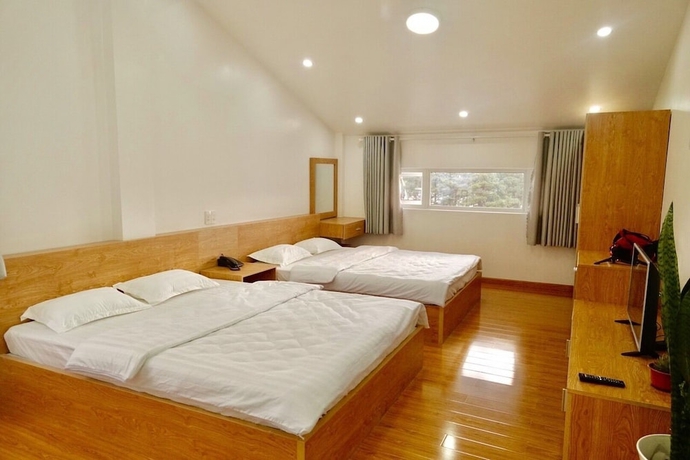 Imagen de la habitación del Hotel Elysian Homestay - Hostel. Foto 7