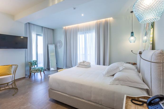 Imagen de la habitación del Hotel Elysian Luxury Hotel and Spa. Foto 7