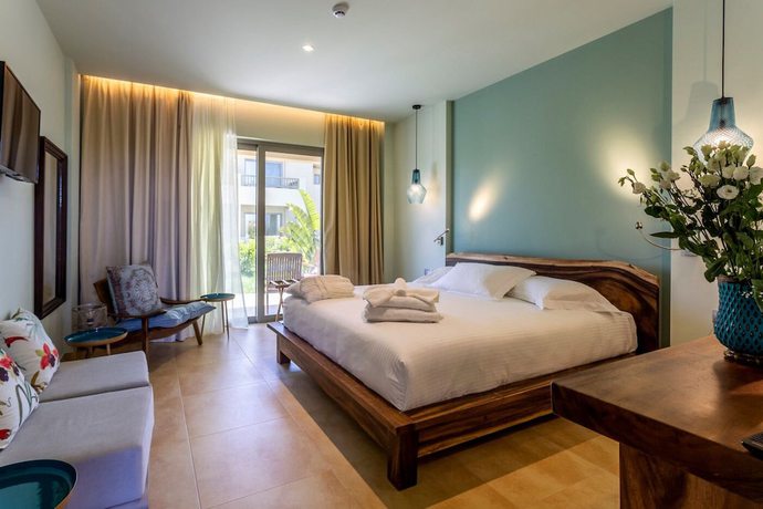 Imagen de la habitación del Hotel Elysian Luxury Hotel and Spa. Foto 8