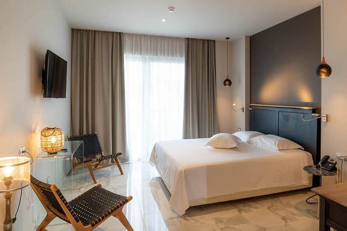 Imagen de la habitación del Hotel Elysian Luxury Hotel and Spa. Foto 10