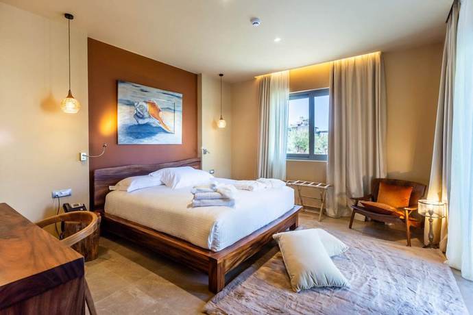 Imagen de la habitación del Hotel Elysian Luxury Hotel and Spa. Foto 11