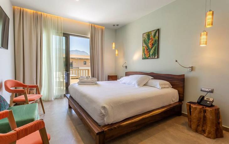 Imagen de la habitación del Hotel Elysian Luxury Hotel and Spa. Foto 12