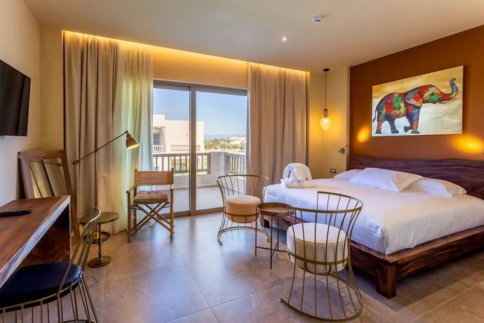 Imagen de la habitación del Hotel Elysian Luxury Hotel and Spa. Foto 16