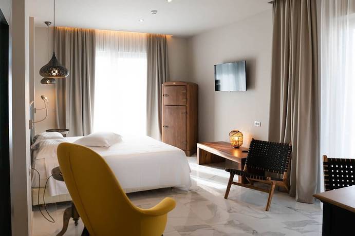 Imagen de la habitación del Hotel Elysian Luxury Hotel and Spa. Foto 17