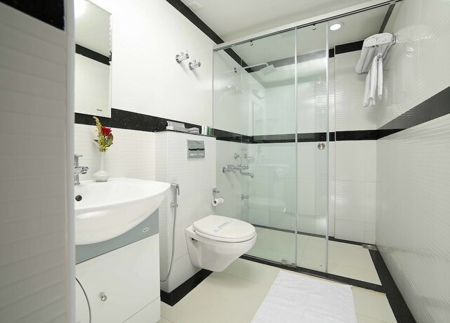Imagen de la habitación del Hotel Elysium Gardens Hill Resorts. Foto 18