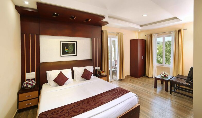 Imagen de la habitación del Hotel Elysium Gardens Hill Resorts. Foto 19