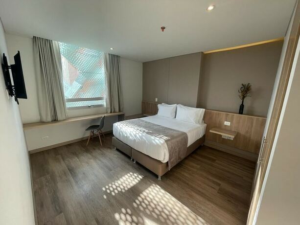 Imagen de la habitación del Hotel Em Budget. Foto 12