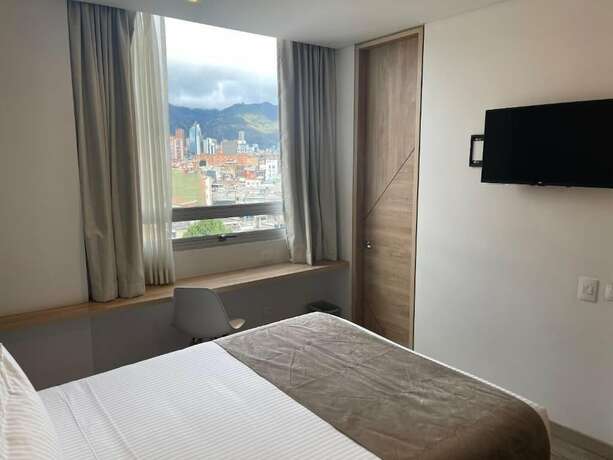 Imagen de la habitación del Hotel Em Budget. Foto 13