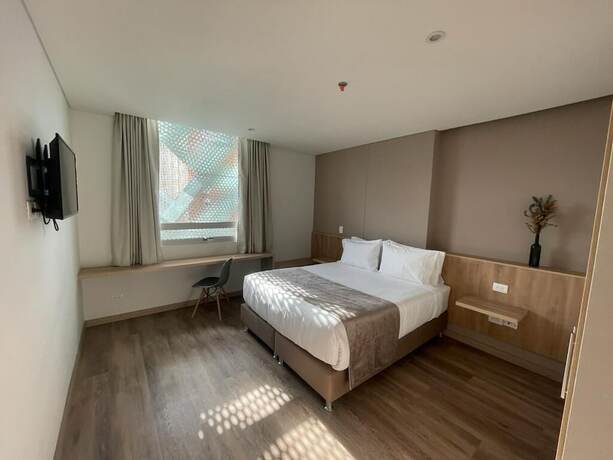 Imagen de la habitación del Hotel Em Budget. Foto 16