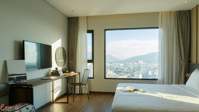 Imagen de la habitación del Hotel Em Oi Boutique. Foto 13