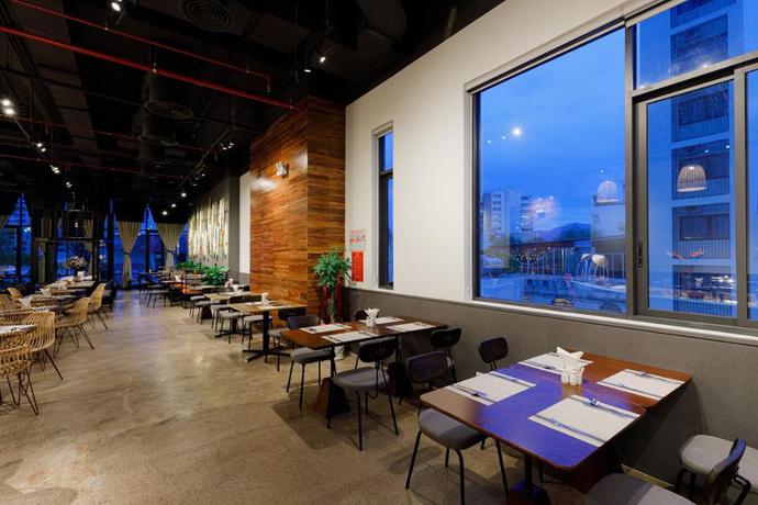 Imagen del bar/restaurante del Hotel Em Oi Boutique. Foto 6