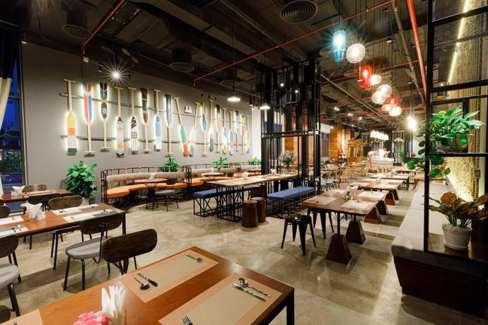 Imagen del bar/restaurante del Hotel Em Oi Boutique. Foto 7