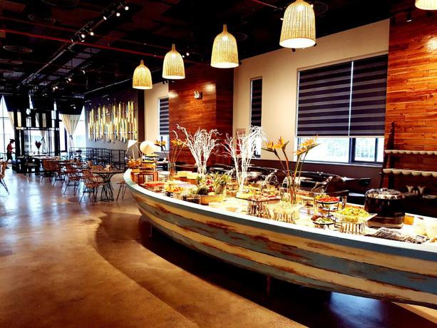 Imagen del bar/restaurante del Hotel Em Oi Boutique. Foto 9