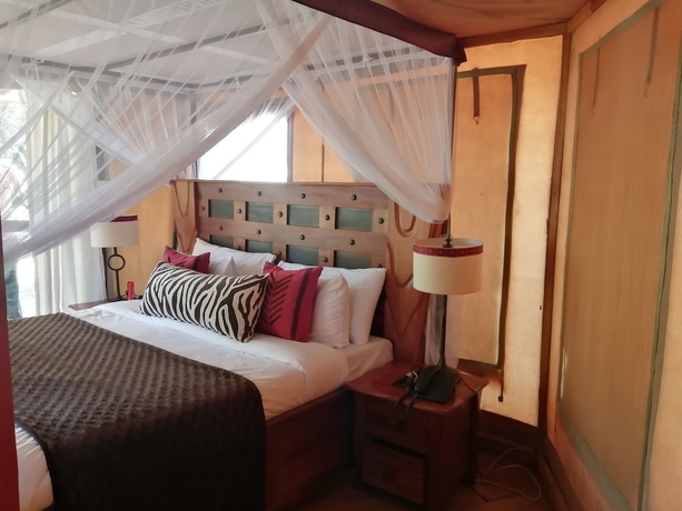 Imagen de la habitación del Hotel Emayian Luxury Camp. Foto 7