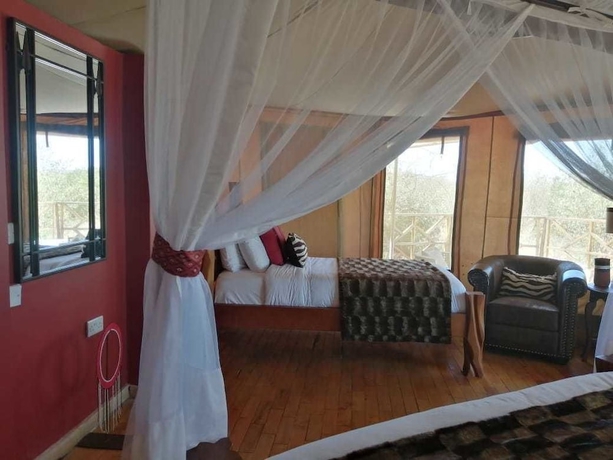 Imagen de la habitación del Hotel Emayian Luxury Camp. Foto 9