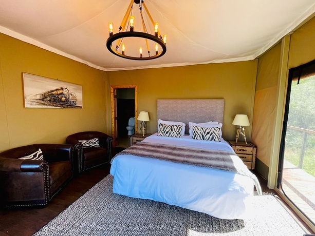 Imagen de la habitación del Hotel Emayian Luxury Camp. Foto 12