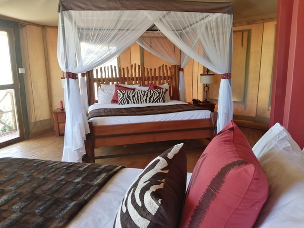 Imagen de la habitación del Hotel Emayian Luxury Camp. Foto 13