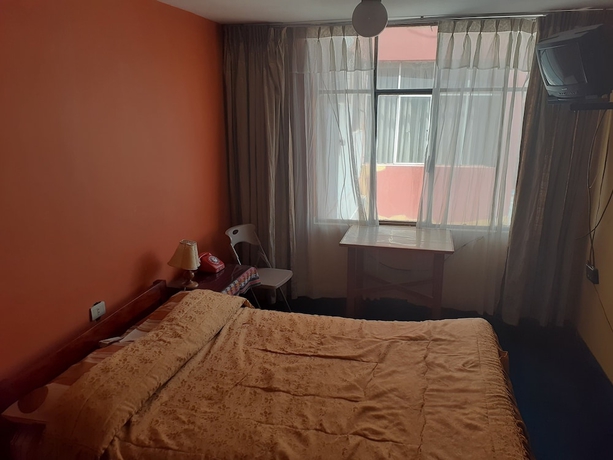 Imagen de la habitación del Hotel Embajador Puno. Foto 10