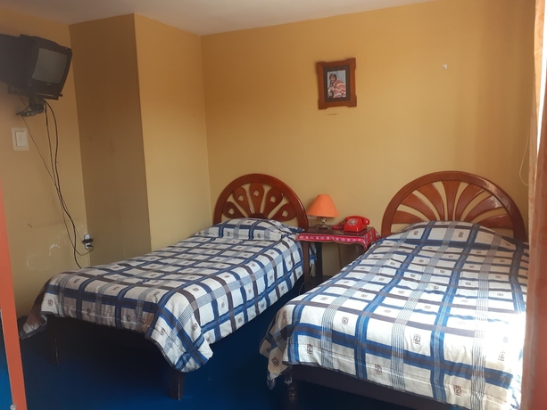 Imagen de la habitación del Hotel Embajador Puno. Foto 14
