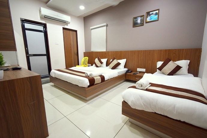 Imagen de la habitación del Hotel Embassy, Gandhinagar. Foto 3