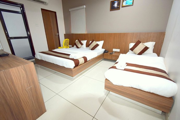 Imagen de la habitación del Hotel Embassy, Gandhinagar. Foto 4