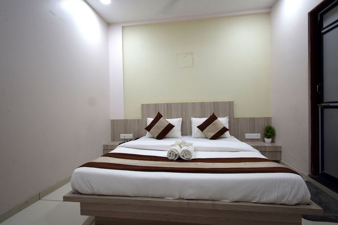 Imagen de la habitación del Hotel Embassy, Gandhinagar. Foto 7