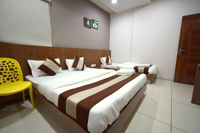 Imagen de la habitación del Hotel Embassy, Gandhinagar. Foto 8