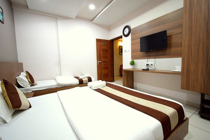 Imagen de la habitación del Hotel Embassy, Gandhinagar. Foto 9