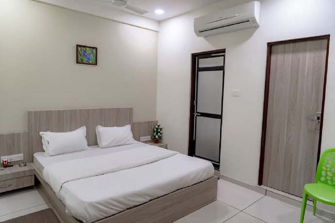 Imagen de la habitación del Hotel Embassy, Gandhinagar. Foto 10