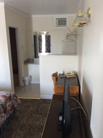 Imagen de la habitación del Hotel Embassy Motel, Kingston. Foto 10