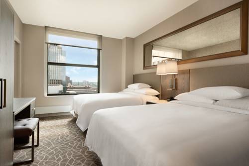Imagen de la habitación del Hotel Embassy Suites By Hilton Minneapolis Downtown. Foto 2