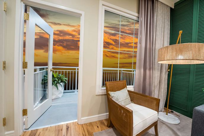 Imagen de la habitación del Hotel Embassy Suites By Hilton Orlando Sunset Walk. Foto 2