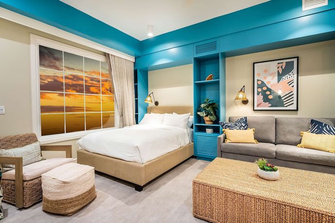 Imagen de la habitación del Hotel Embassy Suites By Hilton Orlando Sunset Walk. Foto 4