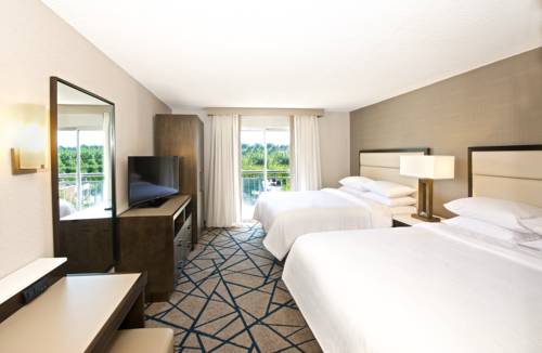 Imagen de la habitación del Hotel Embassy Suites By Hilton Seattle Bellevue. Foto 2