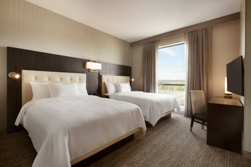 Imagen de la habitación del Hotel Embassy Suites By Hilton Syracuse Destiny Usa. Foto 7