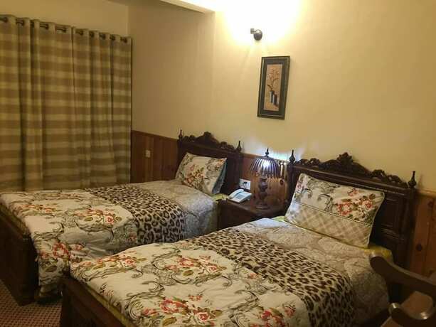 Imagen de la habitación del Hotel Embassy Villa Suites. Foto 13