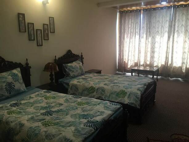 Imagen de la habitación del Hotel Embassy Villa Suites. Foto 14