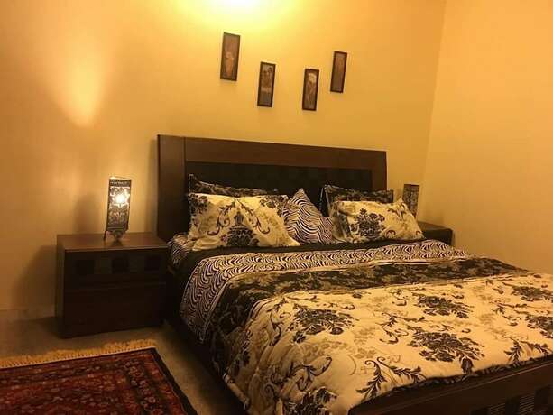 Imagen de la habitación del Hotel Embassy Villa Suites. Foto 15