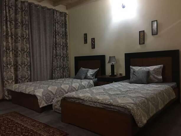 Imagen de la habitación del Hotel Embassy Villa Suites. Foto 18