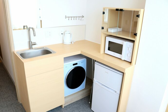 Imagen de la habitación del Hotel Emblem Apartment Kanazawa. Foto 13