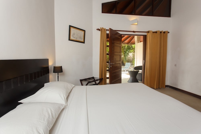 Imagen de la habitación del Hotel Embudu Village. Foto 11