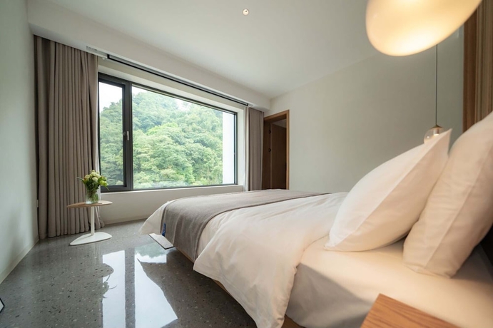 Imagen de la habitación del Hotel Emei Mountain Yi Qing Yin Resort. Foto 4