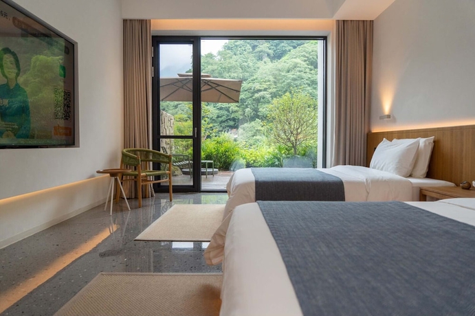 Imagen de la habitación del Hotel Emei Mountain Yi Qing Yin Resort. Foto 10