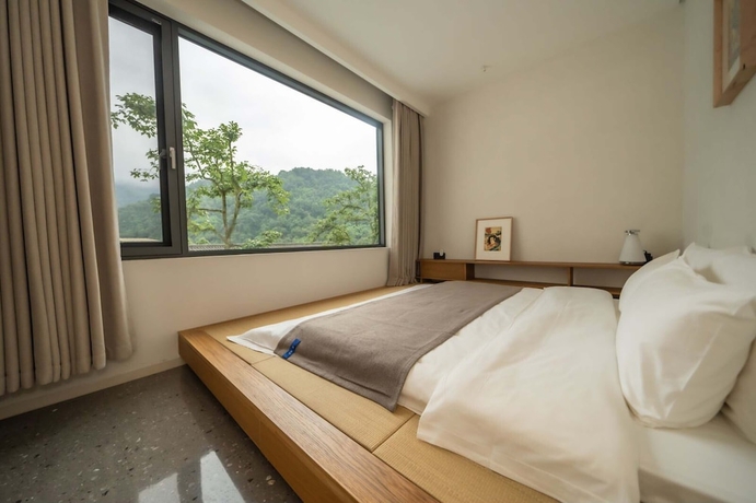 Imagen de la habitación del Hotel Emei Mountain Yi Qing Yin Resort. Foto 12