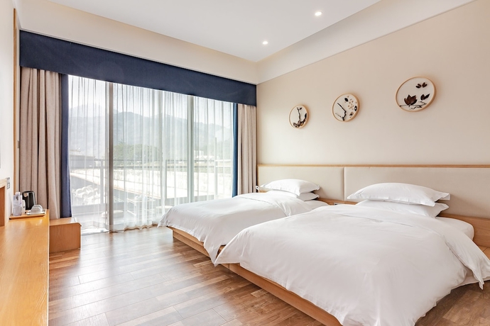 Imagen de la habitación del Hotel Emei Van Stars Mountain Lodge. Foto 2